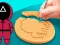 Logħba Squid Game cookie Puzzle onlajn